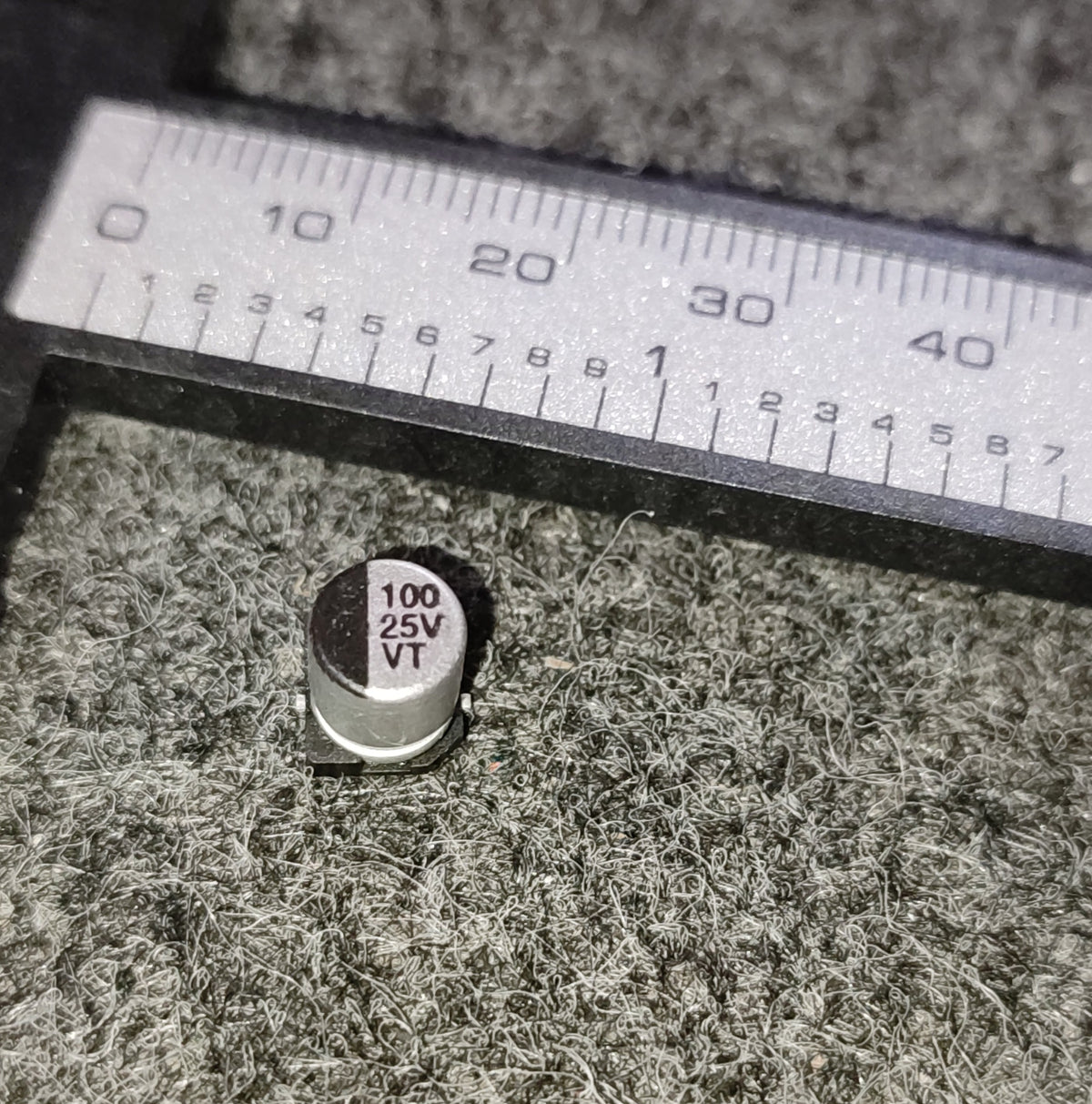 100UF 25V JWCO SMD CAPACITOR ELECTROLYTIC 6.3x7.7MM 105C ETA2783